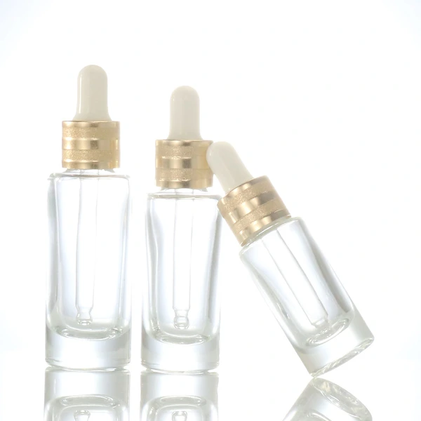 oil dropper bottle  transparent glass bottle  gold lid glass bottle