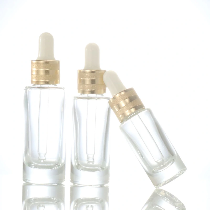oil dropper bottle  transparent glass bottle  gold lid glass bottle