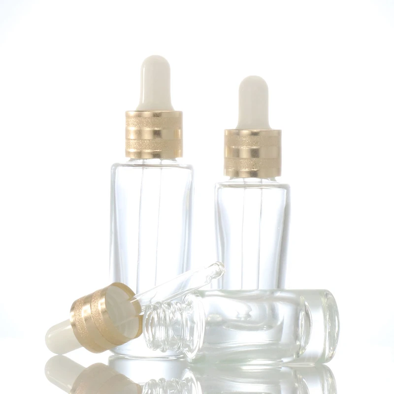 oil dropper bottle  transparent glass bottle  gold lid glass bottle