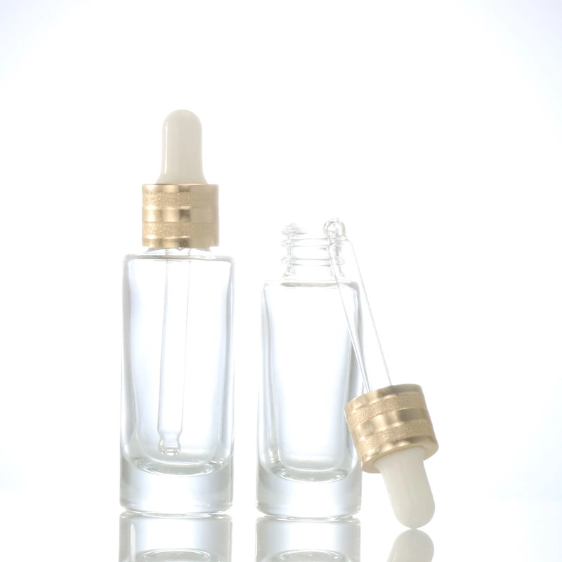 oil dropper bottle  transparent glass bottle  gold lid glass bottle