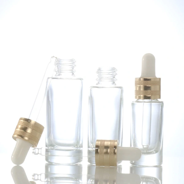 oil dropper bottle  transparent glass bottle  gold lid glass bottle
