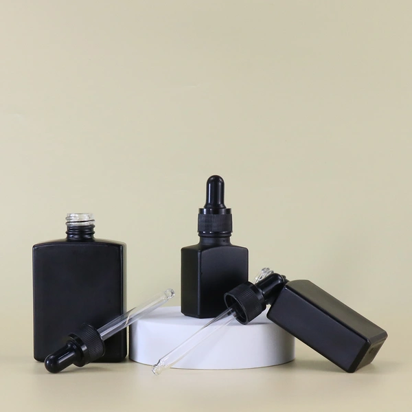 bottle black cosmetic essential  perfume bottle 