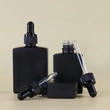 bottle black cosmetic essential  perfume bottle 