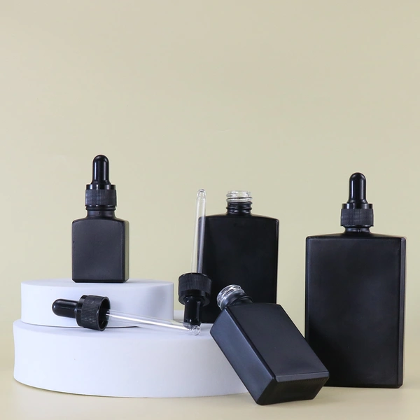 bottle black cosmetic essential  perfume bottle 