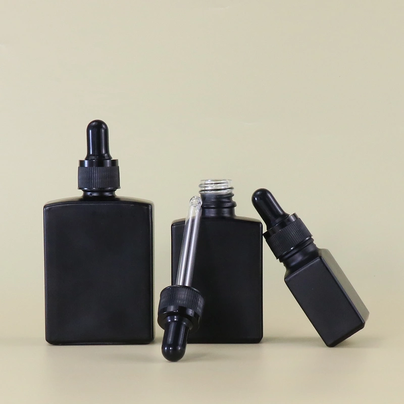 bottle black cosmetic essential  perfume bottle 
