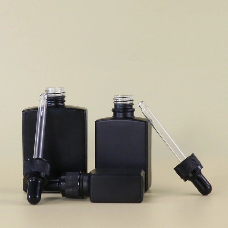 bottle black cosmetic essential  perfume bottle 