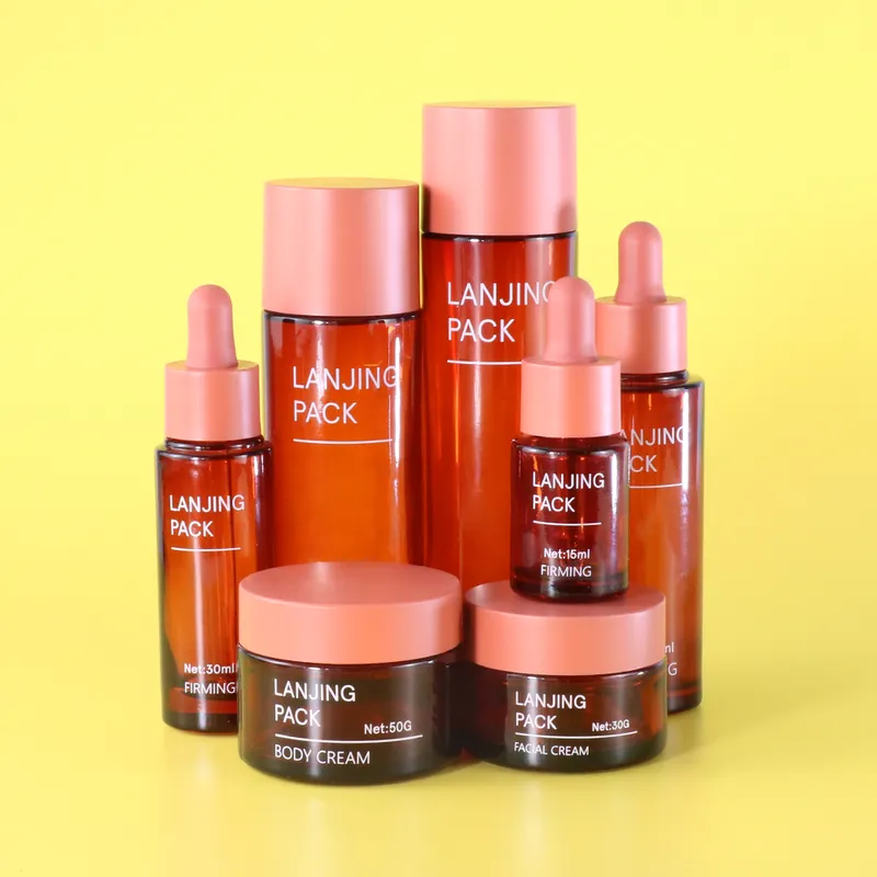 red glass bottle set luxury glass skincare packaging lotion containers