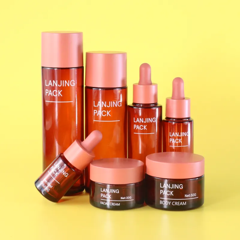 red glass bottle set luxury glass skincare packaging lotion containers