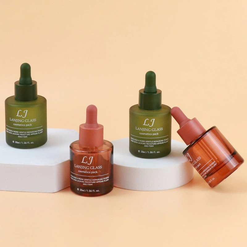 Luxury glass cosmetic containers  30ml flat dropper bottle