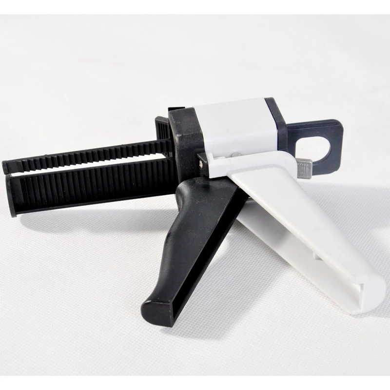 11 Dental Gun for impressional material, glue applicator