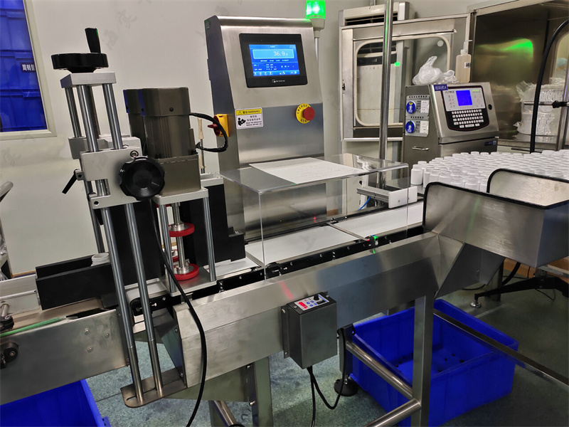 dynamic checkweigher for bottles