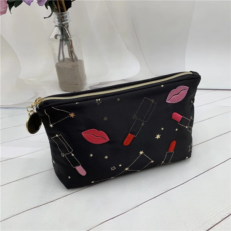 embroidered constellation cosmetic bag