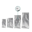 Flat bottom coffee bag with tap zipper air valve