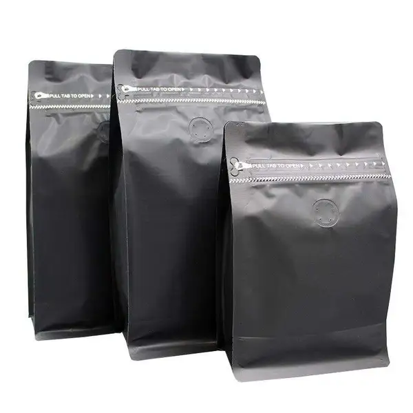 Flat bottom coffee bag with tap zipper air valve