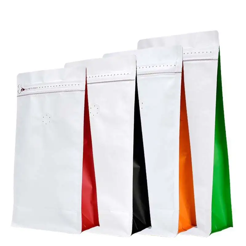 Flat bottom coffee bag with tap zipper air valve