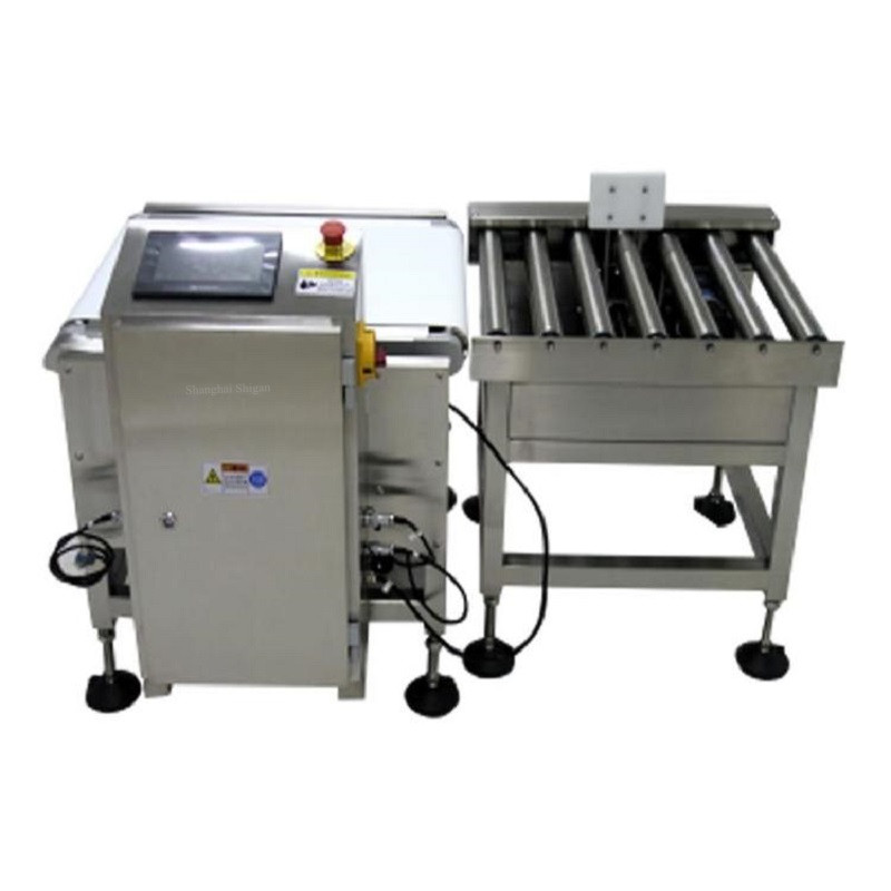 On-line pharmaceutical weighing and grading machine