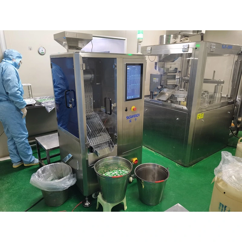 Pharmaceutical Checkweigher Connected to Tablet Press and De-duster - Tablets and Capsules Weight Inspection