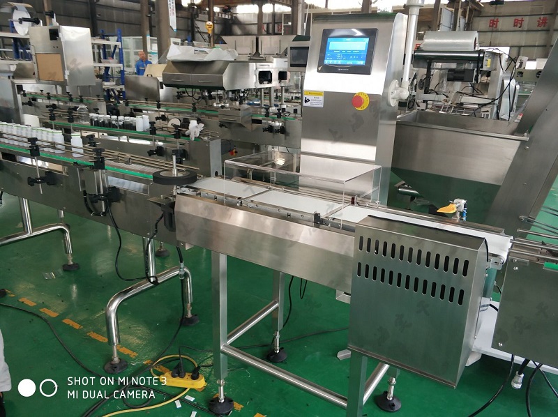 clamping translation checkweigher