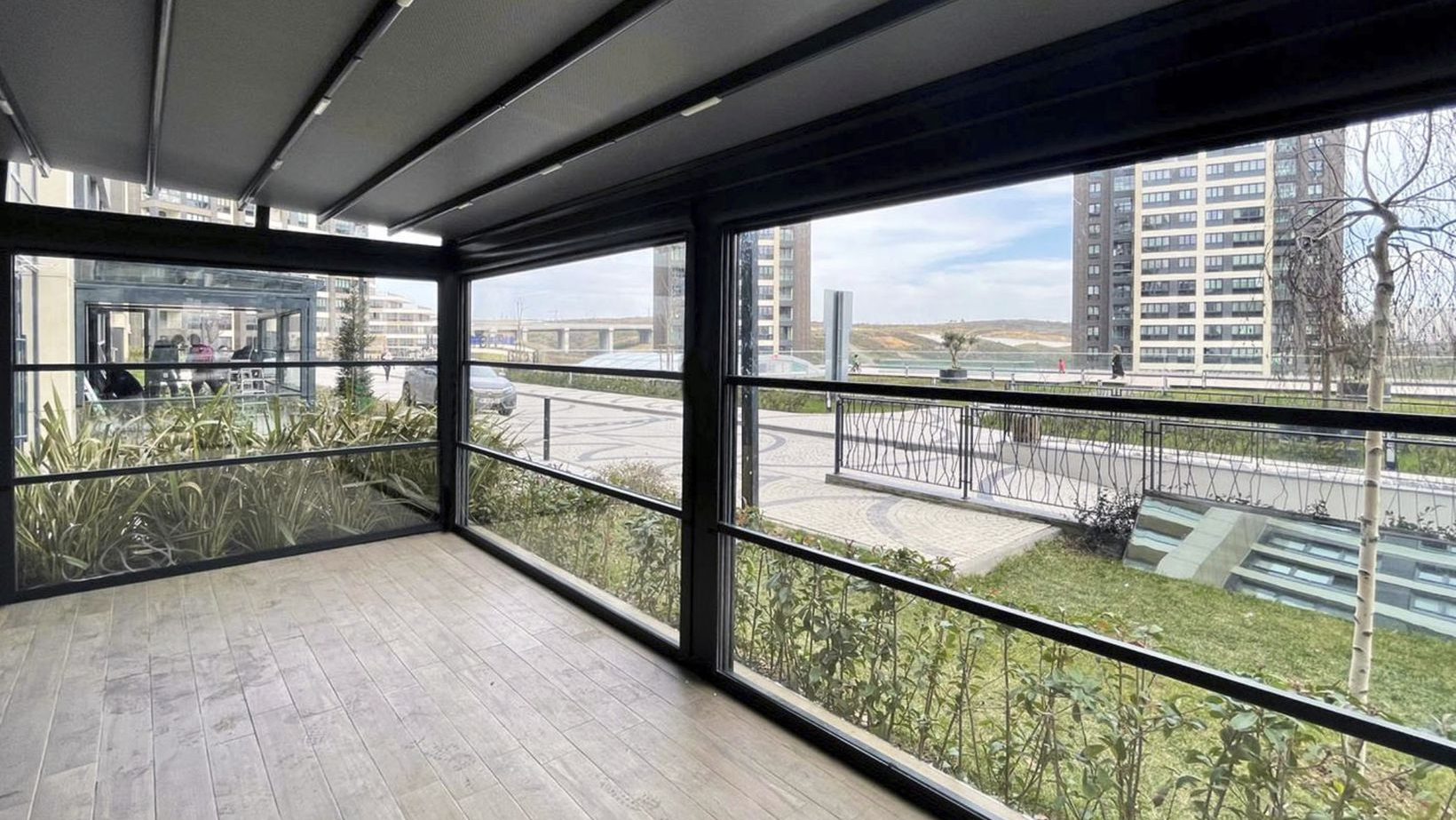 What are the maintenance requirements for vertical glass systems?