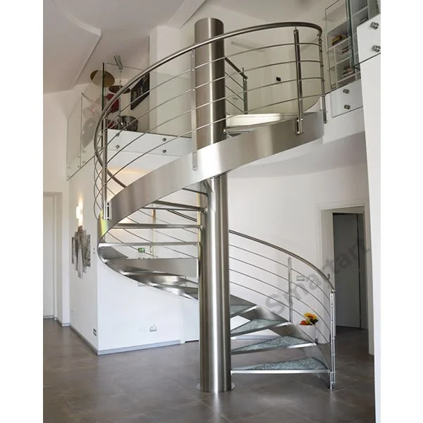 Escalera interior de caracol de cristal y acero de última generación
