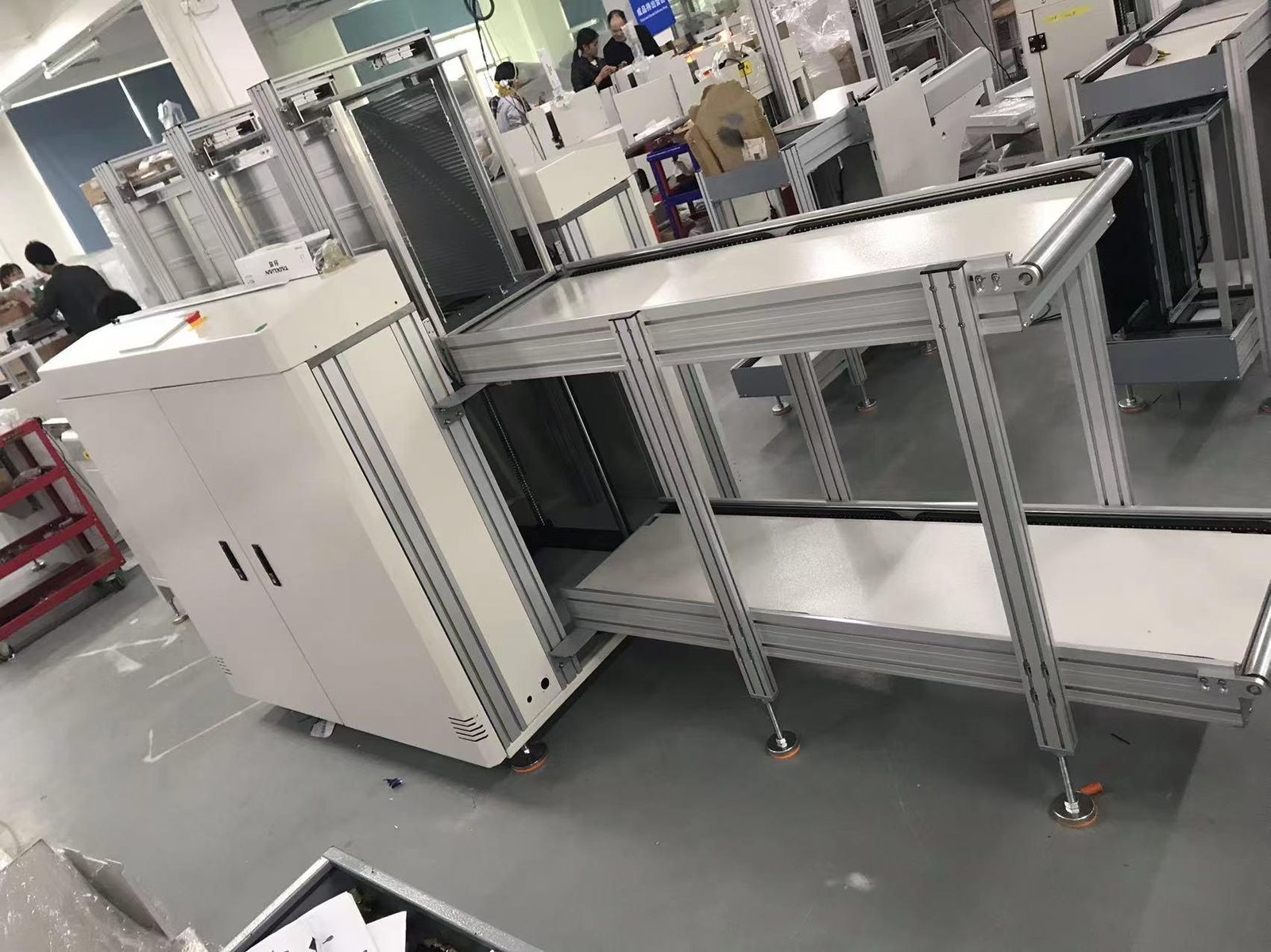 SLD350L 1.2M LED PCB magazine loader on the Southern Machinery factory floor, magazine and conveyor side rail visible