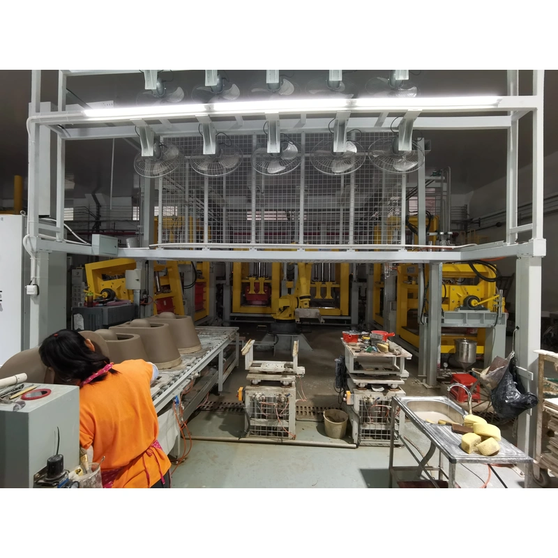 Robotic high-pressure casting and bonding station for WC Pans and Bidets